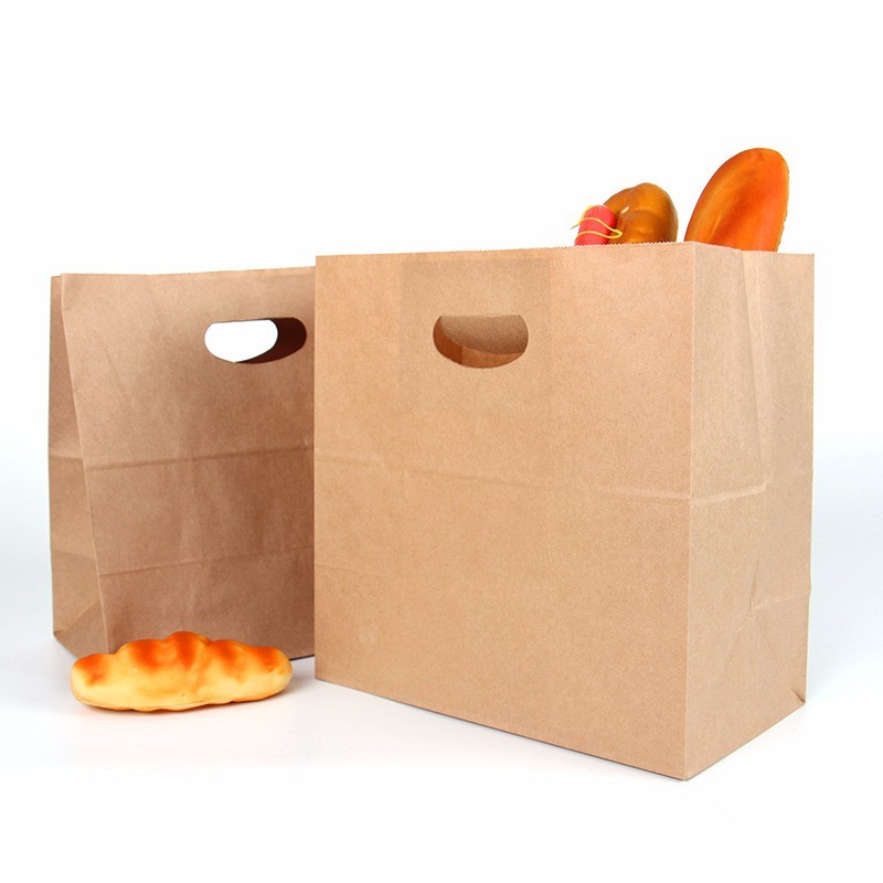 Punched hand-kraft paper bag